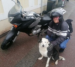 Our biker friend Kevin McCracken of Inverness pauses from a ride to cuddle toobs